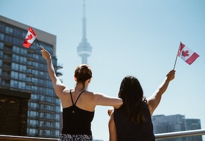Women. Waving Canadian Flag